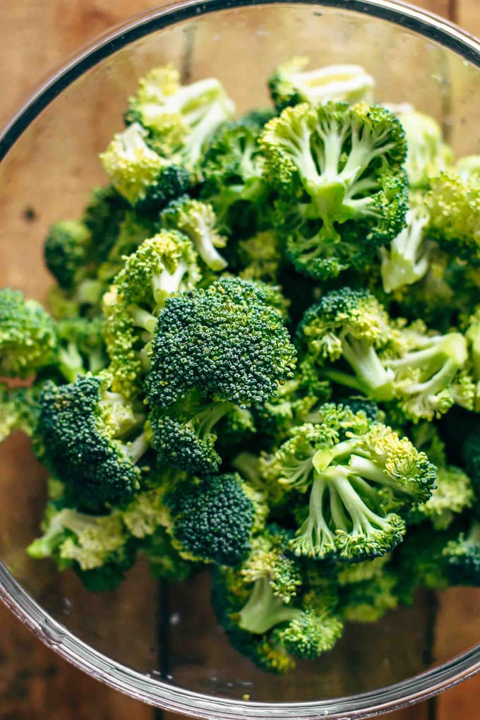 a glass bowl of fresh broccoli