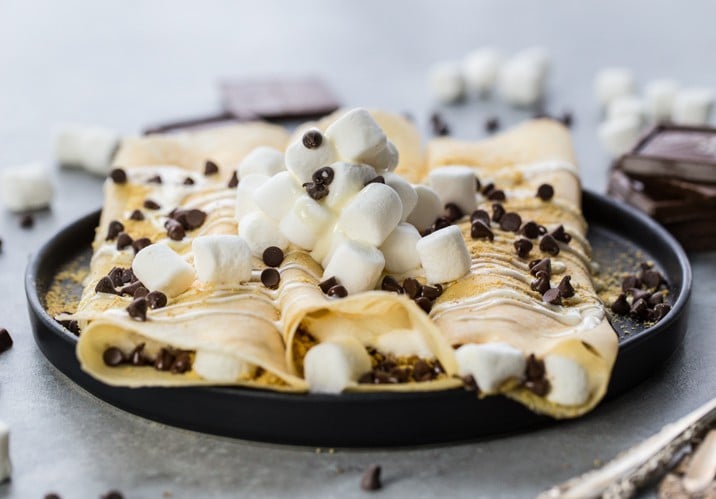 smores crepes on black plate