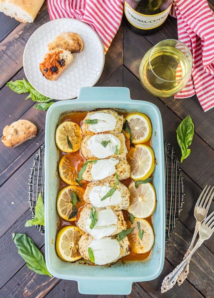 Stuffed Chicken Bryan Rollups! This variation on our favorite Carrabba's recipe is a favorite at our house! Chicken stuffed with a sun dried tomato and goat cheese mixture and then topped with lemon butter sauce and fresh basil! TO DIE FOR!