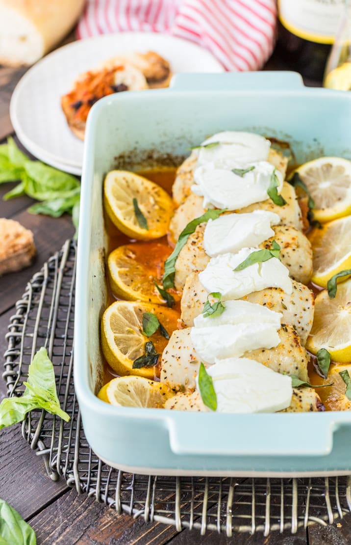 Stuffed Chicken Bryan Rollups! This variation on our favorite Carrabba's recipe is a favorite at our house! Chicken stuffed with a sun dried tomato and goat cheese mixture and then topped with lemon butter sauce and fresh basil! TO DIE FOR!