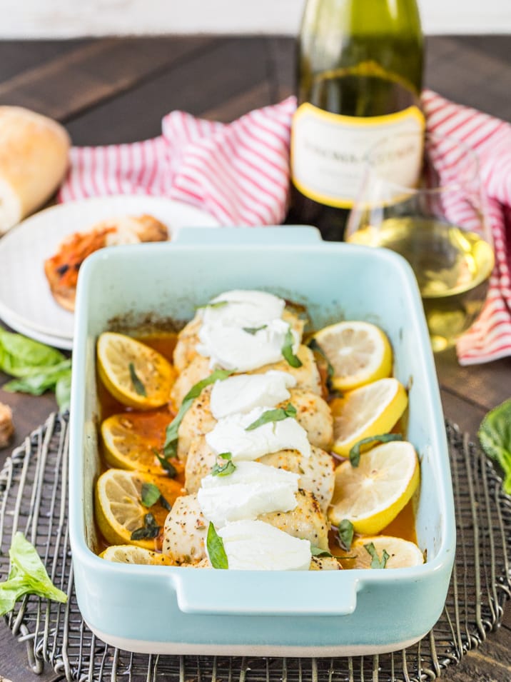 Stuffed Chicken Bryan Rollups! This variation on our favorite Carrabba's recipe is a favorite at our house! Chicken stuffed with a sun dried tomato and goat cheese mixture and then topped with lemon butter sauce and fresh basil! TO DIE FOR!