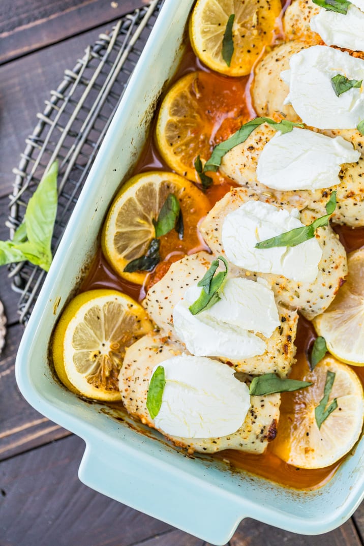 Stuffed Chicken Bryan Rollups! This variation on our favorite Carrabba's recipe is a favorite at our house! Chicken stuffed with a sun dried tomato and goat cheese mixture and then topped with lemon butter sauce and fresh basil! TO DIE FOR!