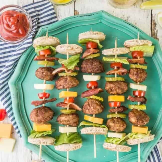 Deconstructed Bacon Cheeseburger Kebabs!! Such a fun and cute appetizer on the grill for Summer. Loaded with meatballs, cheese, bacon, and all the fixings of a great burger!