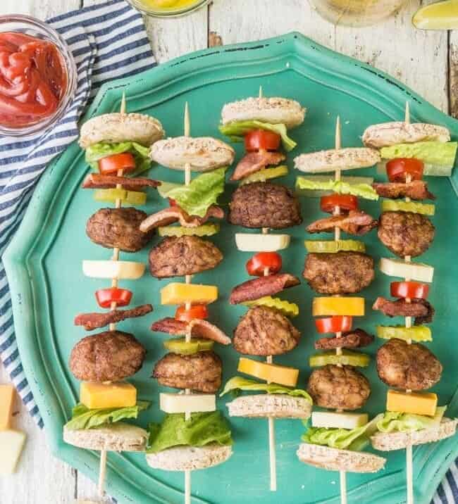 Deconstructed Bacon Cheeseburger Kebabs!! Such a fun and cute appetizer on the grill for Summer. Loaded with meatballs, cheese, bacon, and all the fixings of a great burger!