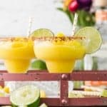 margaritas garnished with lime