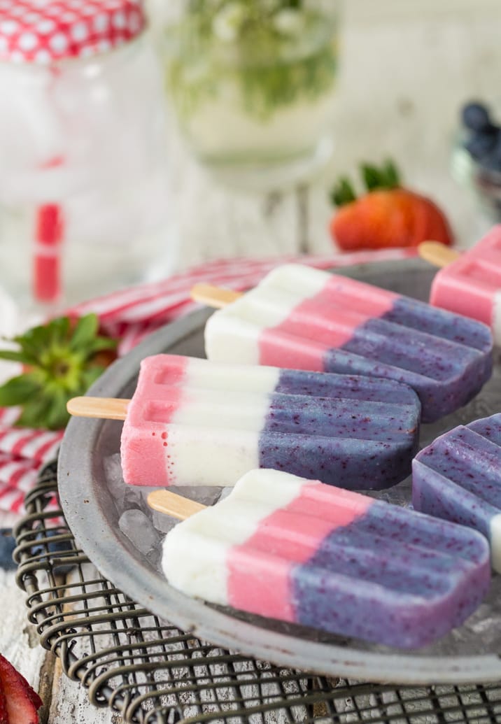view of smoothie popsicles on a bed of ice