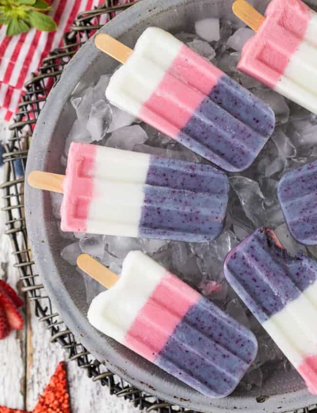 Red White and Blue Smoothie Pops on a bed of ice