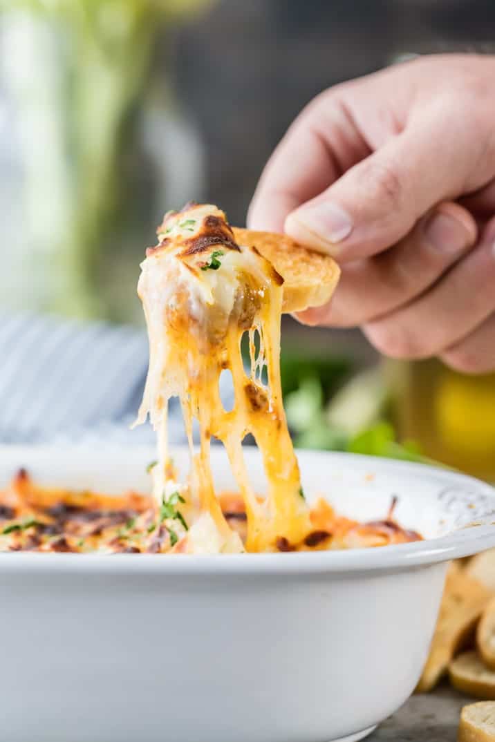 cheese dip on a piece of bread