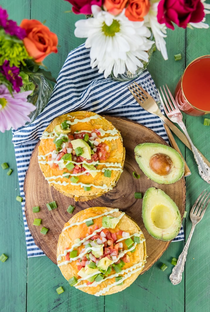 Loaded Breakfast Tostada Stacks! These fun and crispy breakfast tostadas are loaded with egg, cheese, sausage, and avocado! Makes for perfect mornings!
