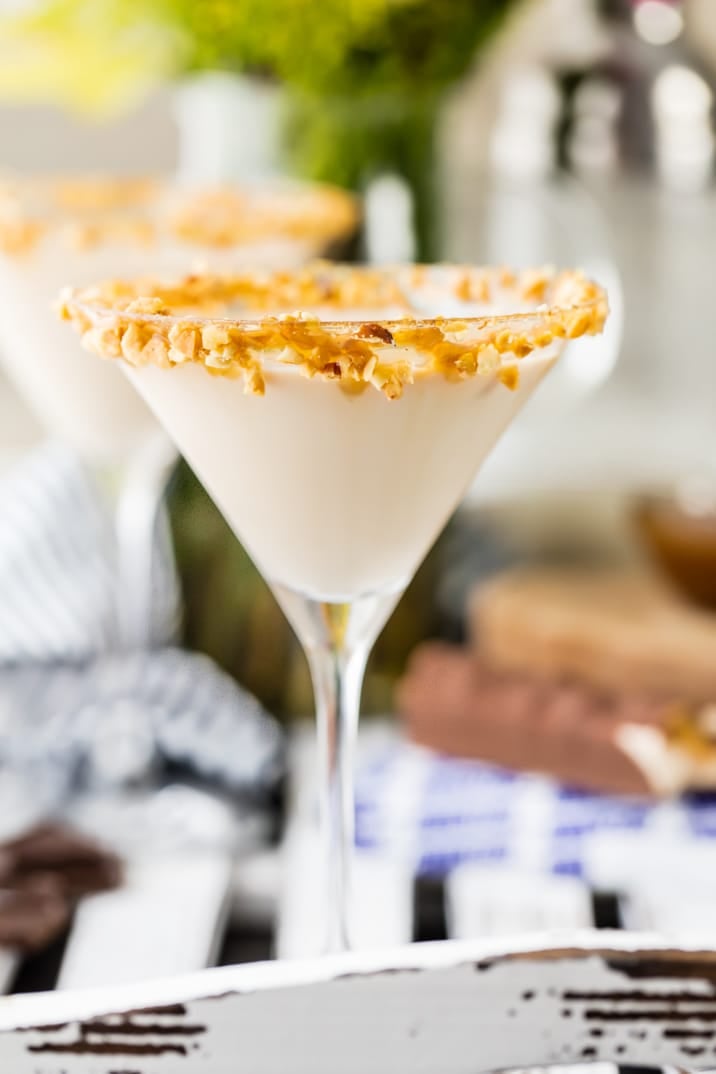 creamy martini glass on a tray