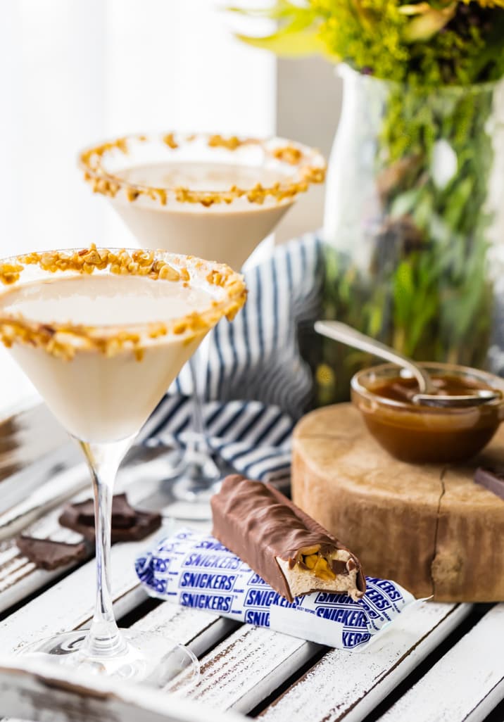 a martini next to snickers ice cream bars