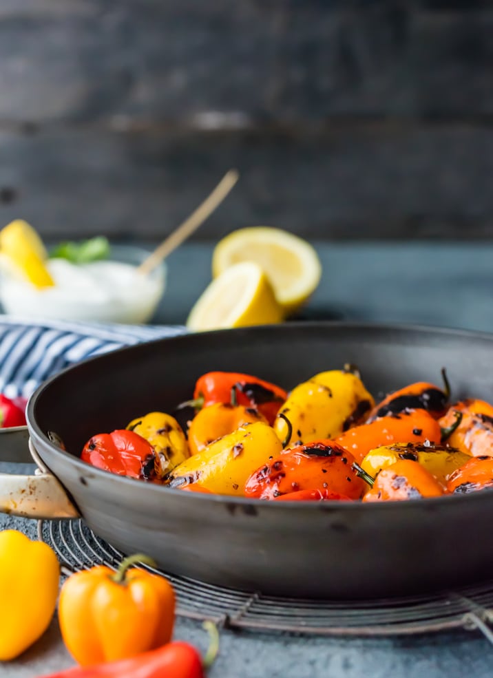 close up view of peppers on a skillet