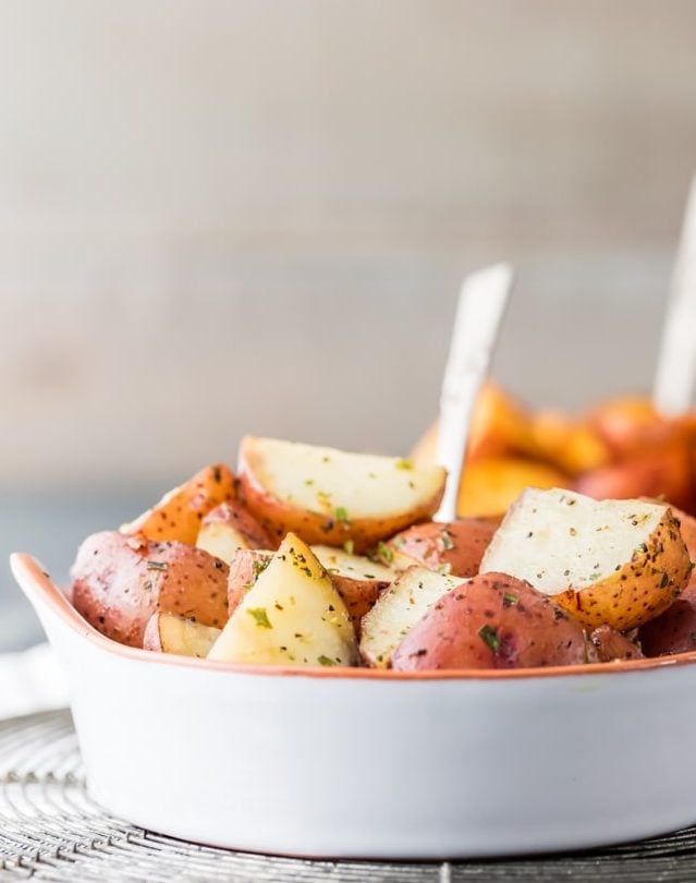Crock Pot Potatoes are our favorite easy side dish recipe! We have made these Slow Cooker Potatoes two ways, in Garlic Ranch and Taco flavored! My mind is blown by how simple making Crockpot Red Potatoes can be...and the sky is the limit with flavors. This recipe is amazing as a side dish to almost any meal...such a great weeknight option.