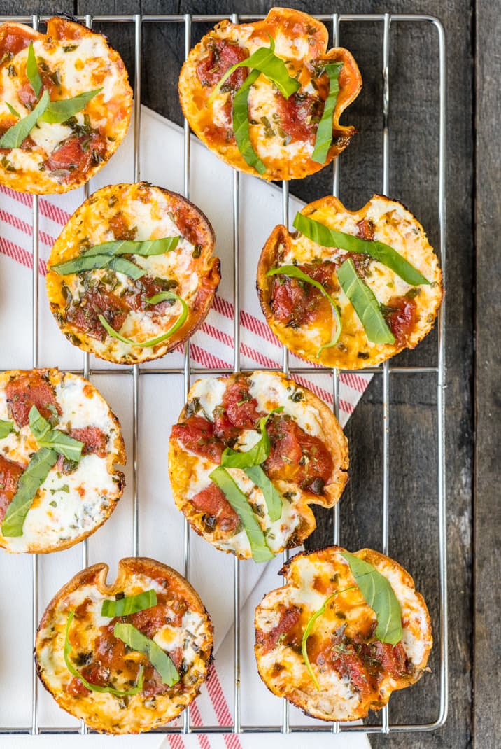 mini pizzas on a baking rack