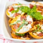 Mini Margherita Pizzas are THE BEST tailgate recipe! Delicious, easy, amazing appetizer perfect for any party or tailgate! YUM!