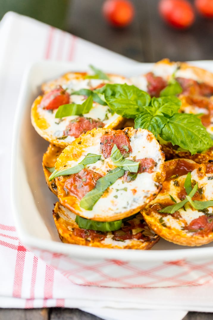 a plate of mini pizzas made with tortillas