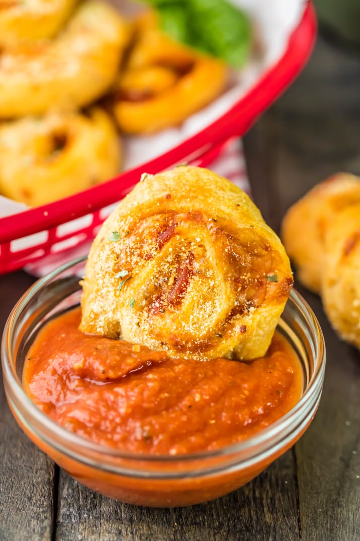 bowl of marinara with pizza roll in it