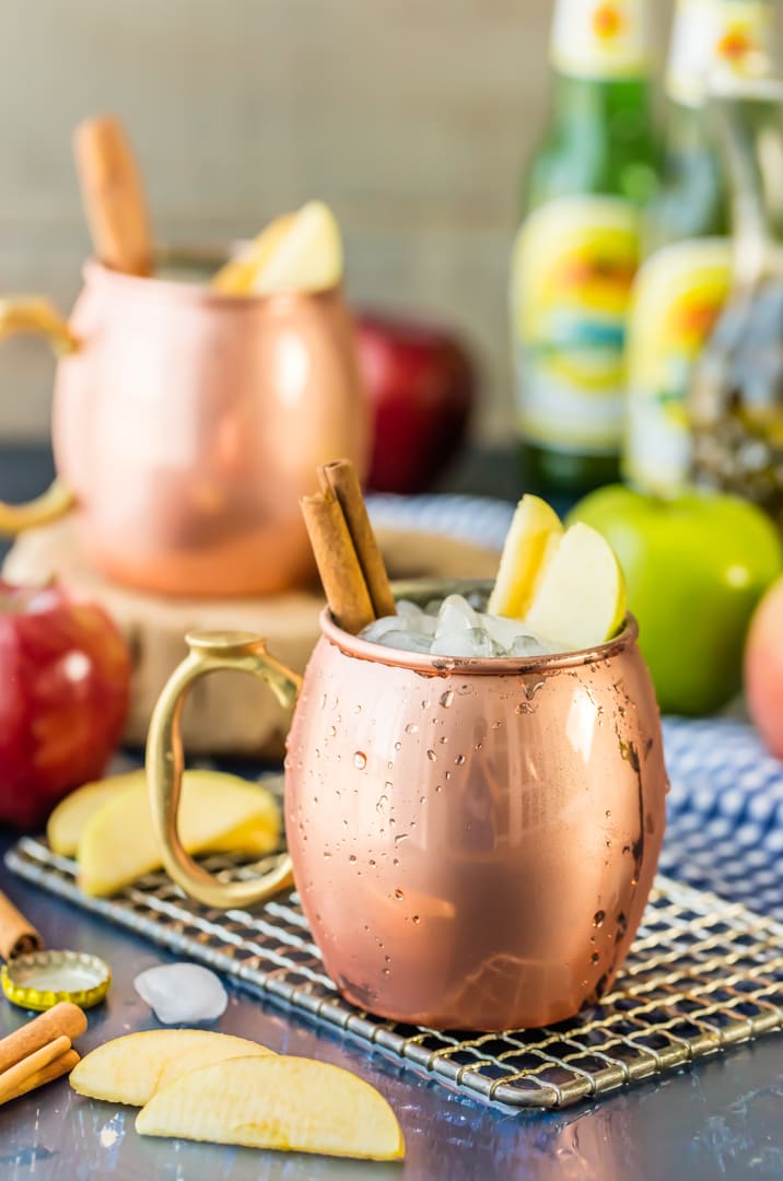 copper mugs filled with apple pie moscow mules