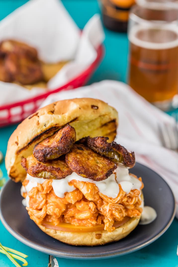 pulled buffalo chicken sandwich topped with ranch fried pickles