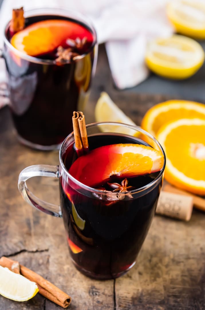 Simple mulled wine recipe, garnished with orange and cinnamon