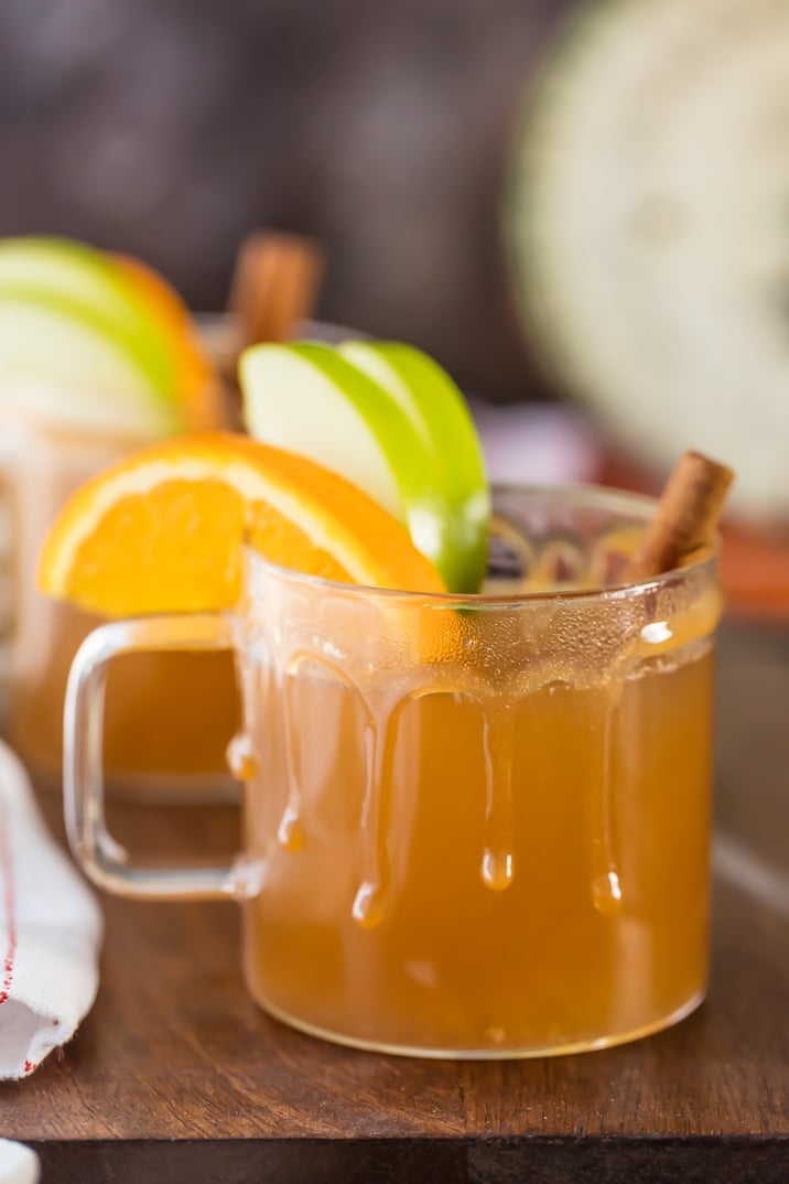 Crockpot apple cider in two clear mugs