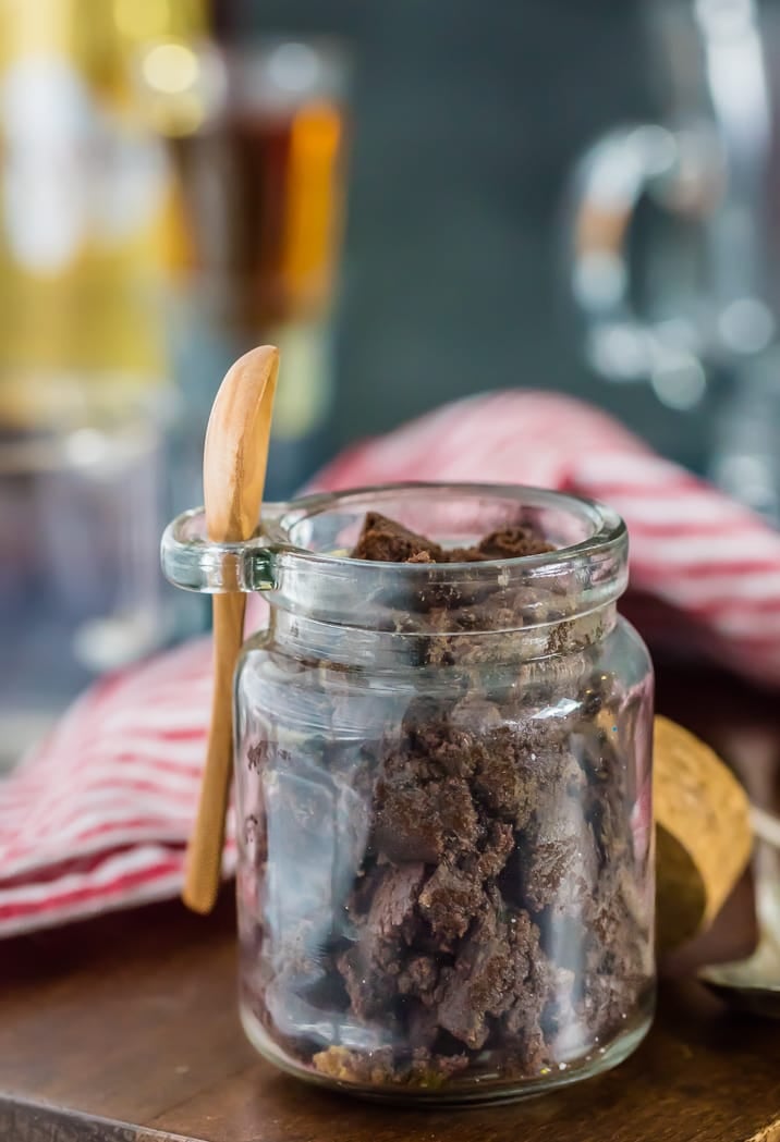 Chocolate Hot Buttered Rum Mix in a glass jar with a small spoon
