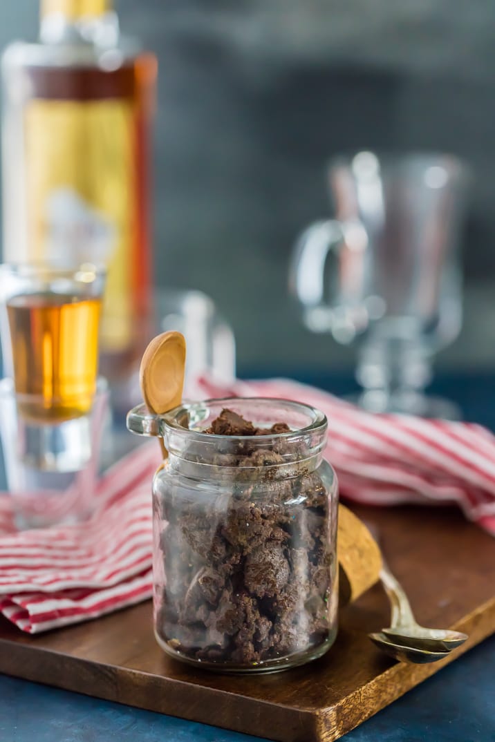 A cup of coffee on a table, with Butter and Chocolate