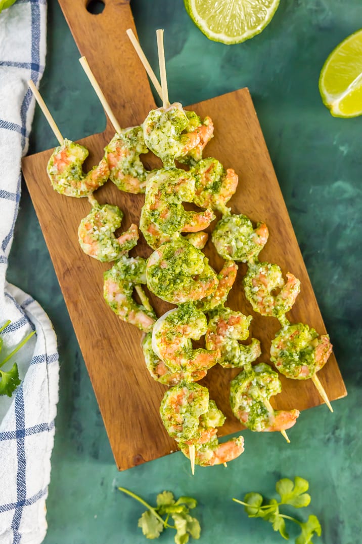 Pesto Shrimp on wooden cutting board