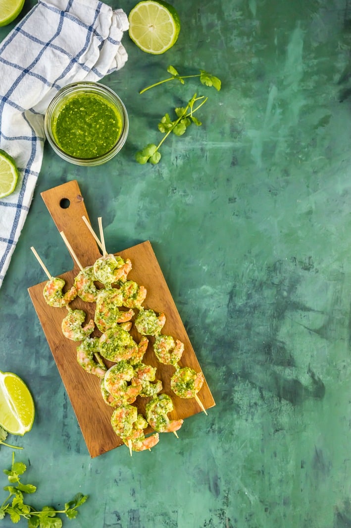 Easy Pesto Shrimp Two Ways! Cilantro Lime Pesto and Basil Lime Pesto with grilled shrimp is the PERFECT healthy recipe for holiday appetizers!