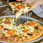 Easy Gourmet White Pizza Copycat. This pizza is SO GOOD! Made to be like the popular Mellow Mushroom Pizza favorite. Lots of cheese, two types of tomatoes, and an olive oil garlic base. BEST RECIPE EVER!