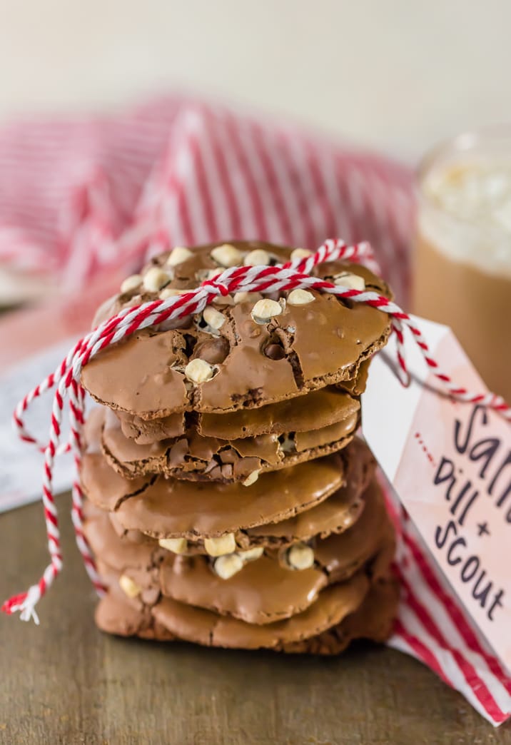 stack of flourless hot chocolate cookies tied in red and white ribbon