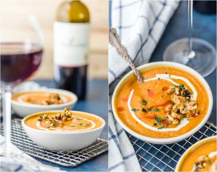 glass of red wine and bowls of soup