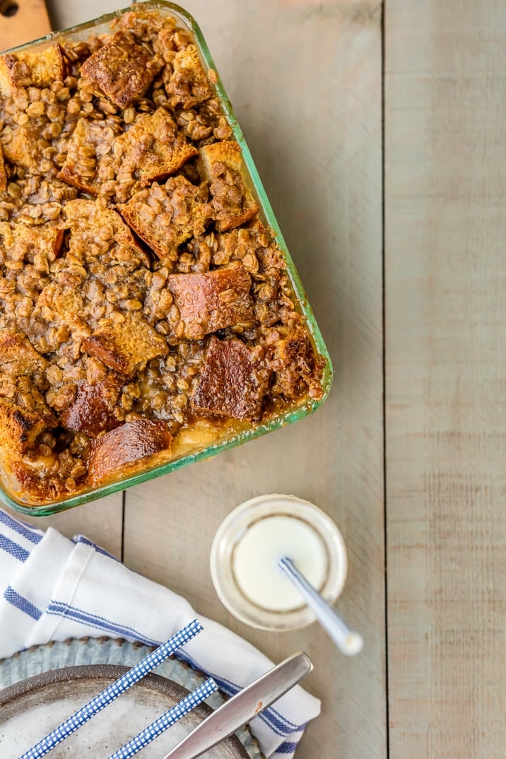 This Apple Pie Bread Pudding recipe is the perfect holiday dessert! We love bread pudding around here, so we added this Caramel Apple Bread Pudding to our recipe collection. It's good for dessert, or even for Christmas morning breakfast! Caramel Apple Bread Pudding in a baking dish