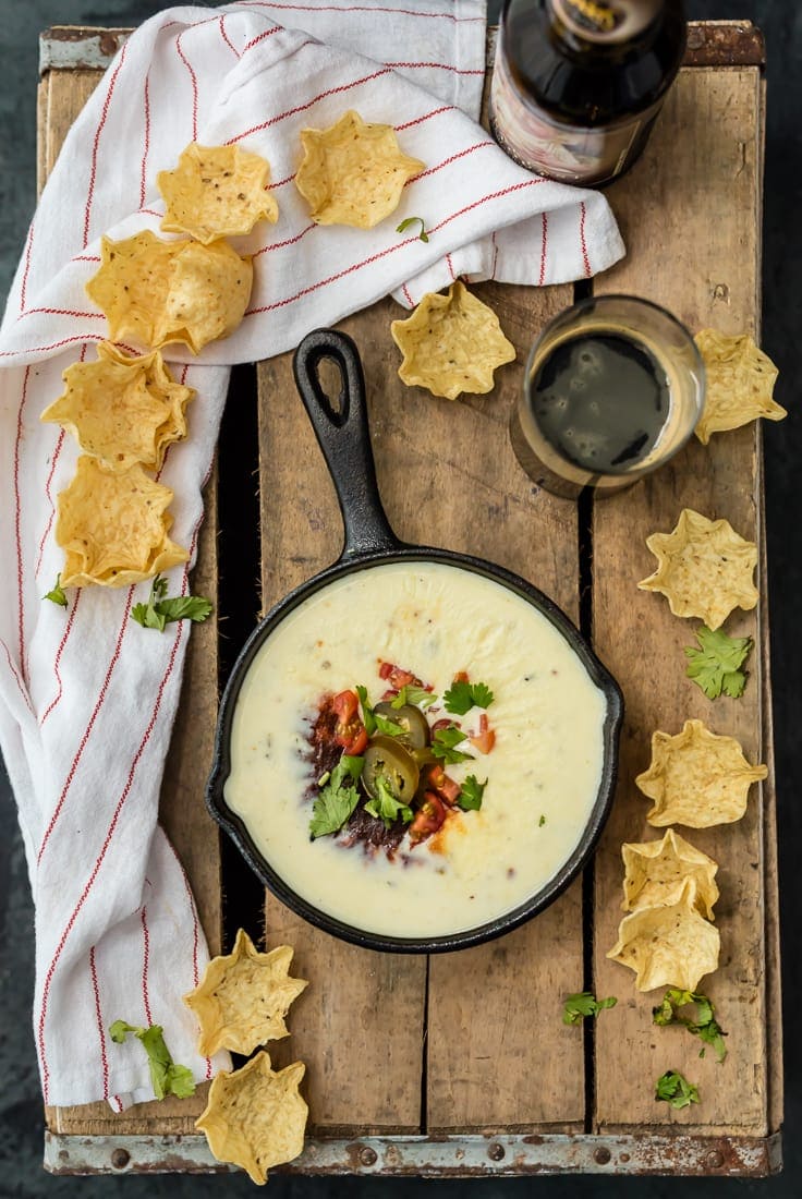 white queso dip served in cast iron skillet