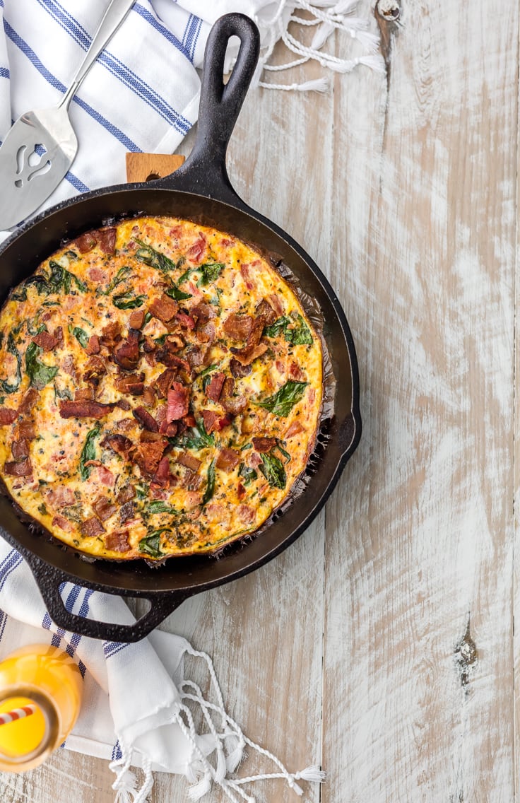 One Pan BLT Skillet Frittata is so easy to whip up for breakfast or brunch. All your favorite BLT flavors in one hearty, wholesome breakfast dish! One Pan Skillet BLT Frittata in cast iron pan