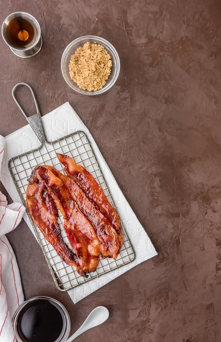 sky shot of oven baked candied whiskey bacon with brown sugar and bourbon