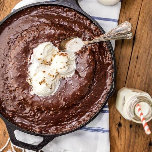 Texas Chocolate Sheet Cake is a classic, and this fun skillet version is just as gooey, chocolatey, and delicious! This easy chocolate cake recipe is just as easy as baking it in a sheet pan. Top this tasty skillet dessert with ice cream and dig in!