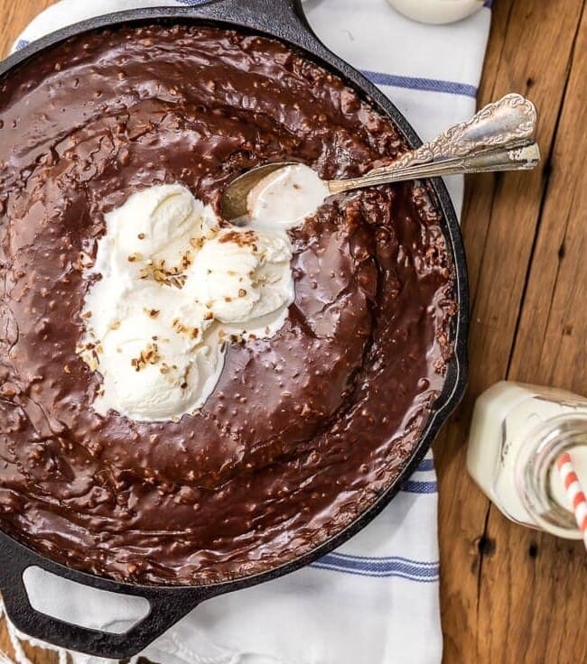 Texas Chocolate Sheet Cake is a classic, and this fun skillet version is just as gooey, chocolatey, and delicious! This easy chocolate cake recipe is just as easy as baking it in a sheet pan. Top this tasty skillet dessert with ice cream and dig in!