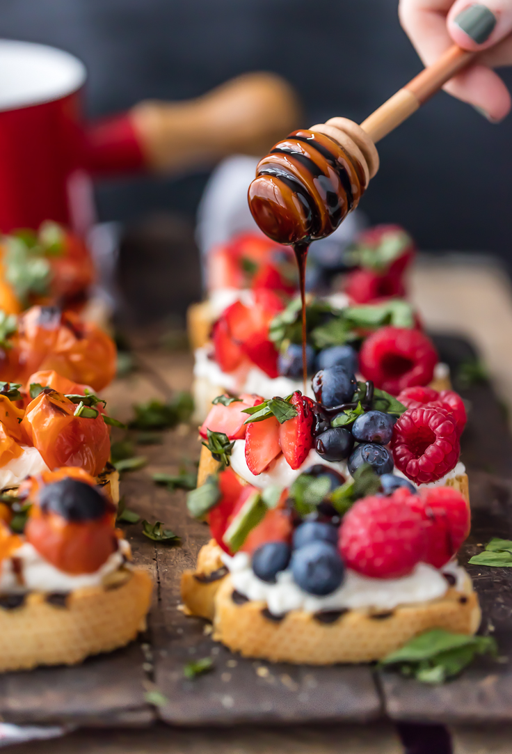 TRIPLE BERRY WHIPPED GOAT CHEESE BRUSCHETTA is beautiful and delicious! Plus a Caprese Whipped Goat Cheese Bruschetta that is everyone's favorite! Drizzled with balsamic reduction. Best classy appetizer for any occasion!