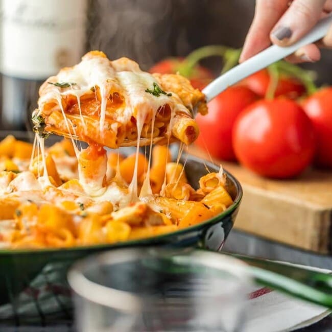 ONE PAN Chicken Parmesan Pasta Skillet, with only 6 ingredients! This is our go-to easy recipe anytime we are craving comfort food. Delicious one pot pasta everyone will love!