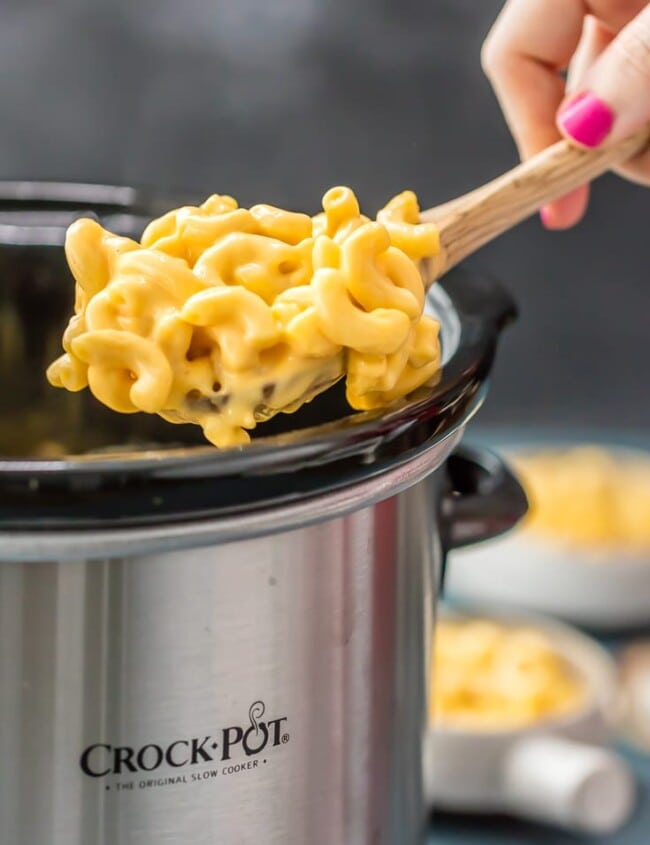 Slow Cooker Mac and Cheese is a super easy crock pot recipe, perfect for any occasion!  Crock Pot Mac n cheese is virtually fool proof and comes out creamy and extra cheesy every time. Crock Pot Macaroni and Cheese is one of the best cheesy comfort foods around!