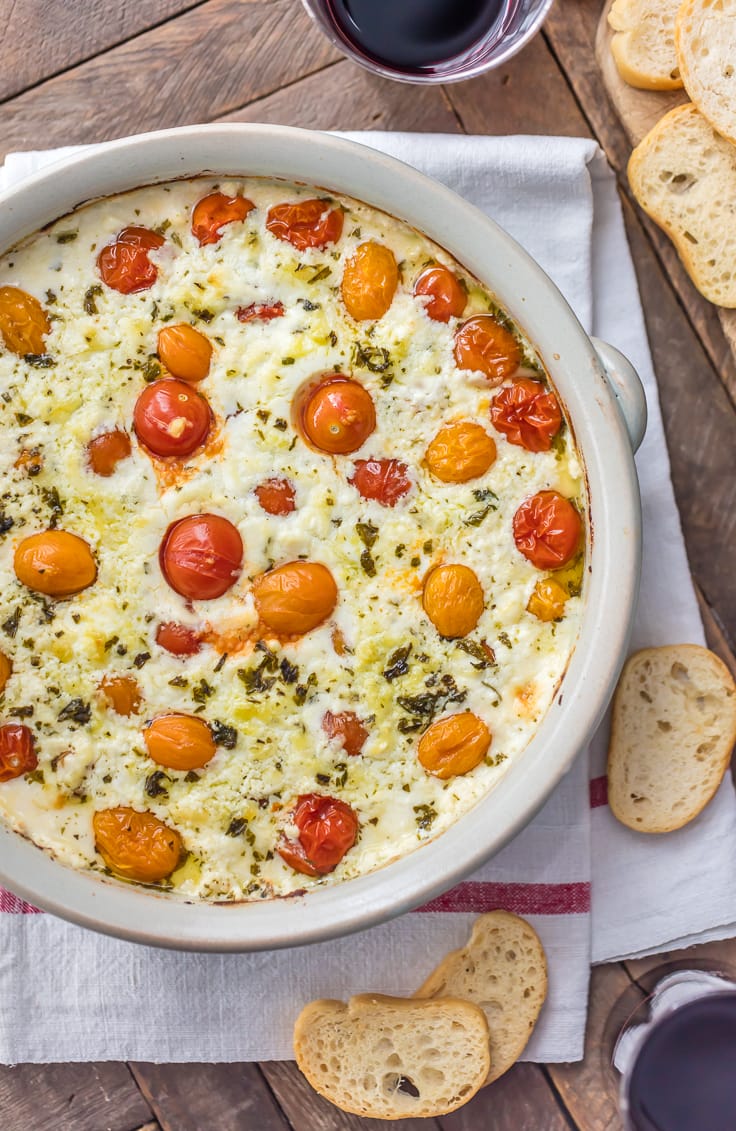 goat cheese dip filled with cherry tomatoes