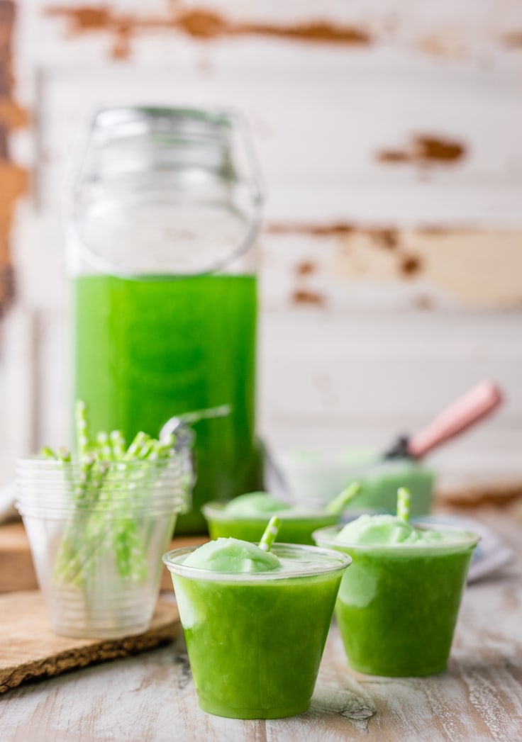 green punch in plastic cups