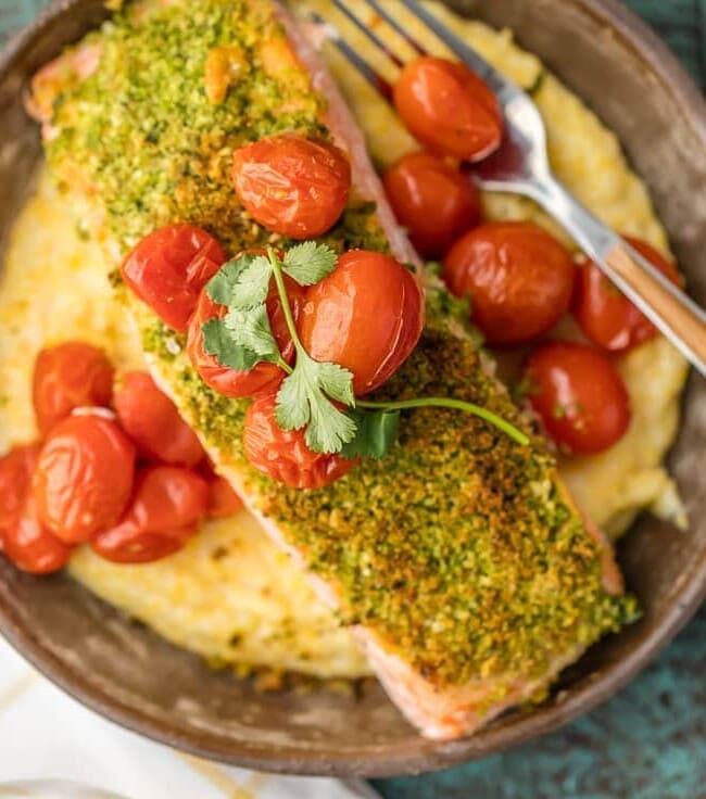 Herb Crusted Salmon with Goat Cheese Polenta on a plate