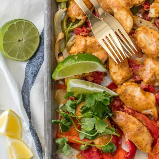 SKINNY BAKED SHEET PAN CHICKEN FAJITAS are our favorite healthy dinner! Such an easy recipe that everyone will love. Made with greek yogurt instead of sour cream! Perfection.