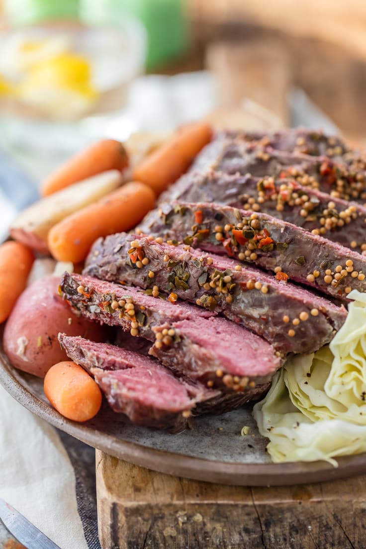 Traditional Slow Cooker Corned Beef and Cabbage, and MUST MAKE for St. Patrick's Day! Such an fun and easy recipe to celebrate St. Patricks Day! Corned Beef, Cabbage, Potatoes, and Carrots!