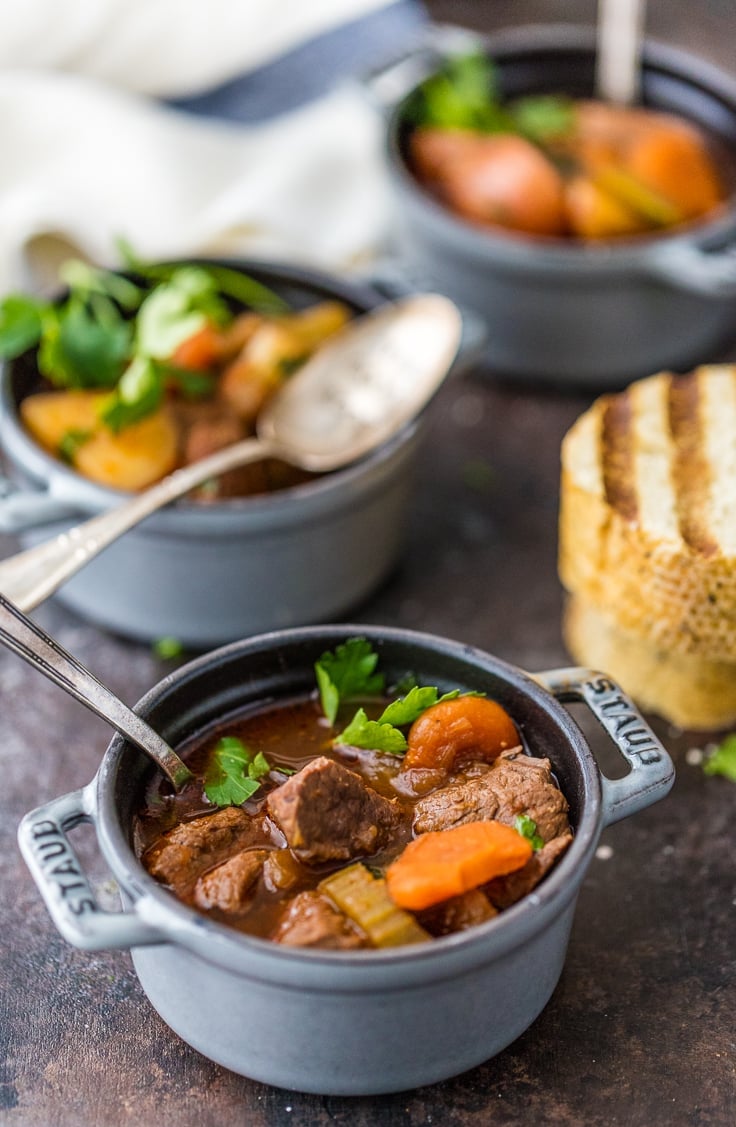 bowls of Irish stew with beef, Guinness, carrots, and potatoes 