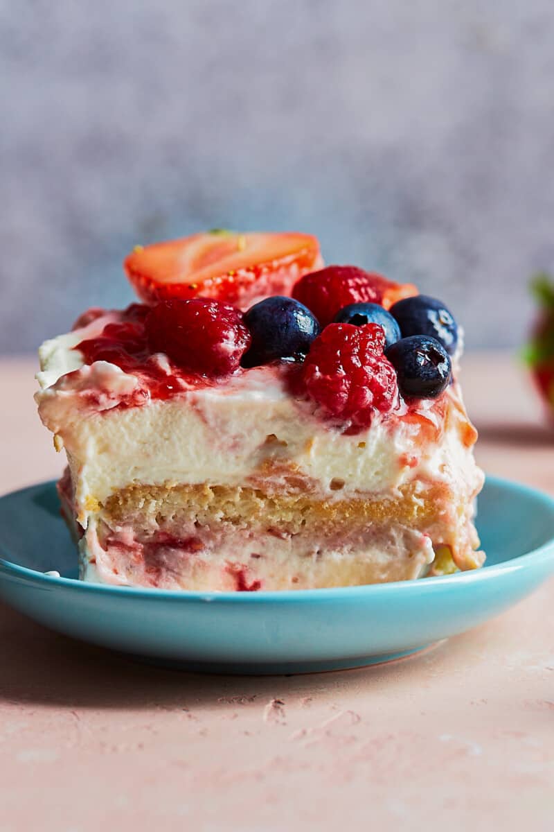 up close slice of triple berry tiramisu