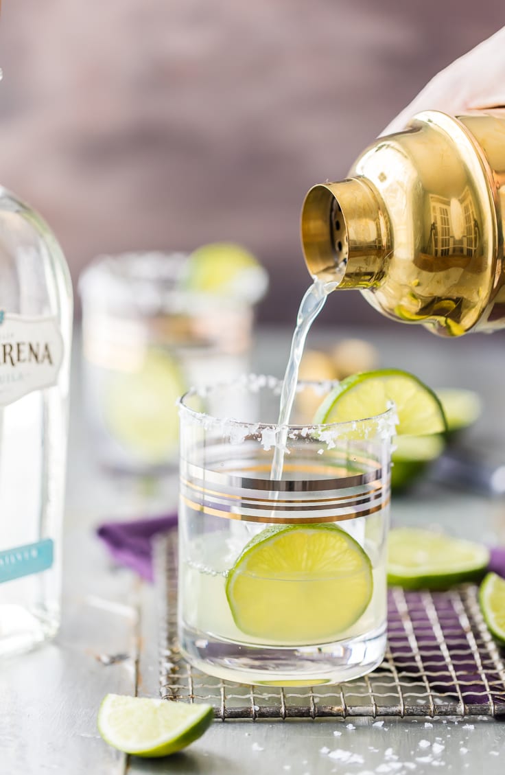 This Skinny Margarita Recipe is my go-to simple margarita recipe! With only 5 ingredients (good tequila, fruit juices, agave nectar, and soda) and lots of flavor, this classic margarita is a guilt free cocktail.Â This Skinny Margarita is just perfect for Cinco de Mayo!