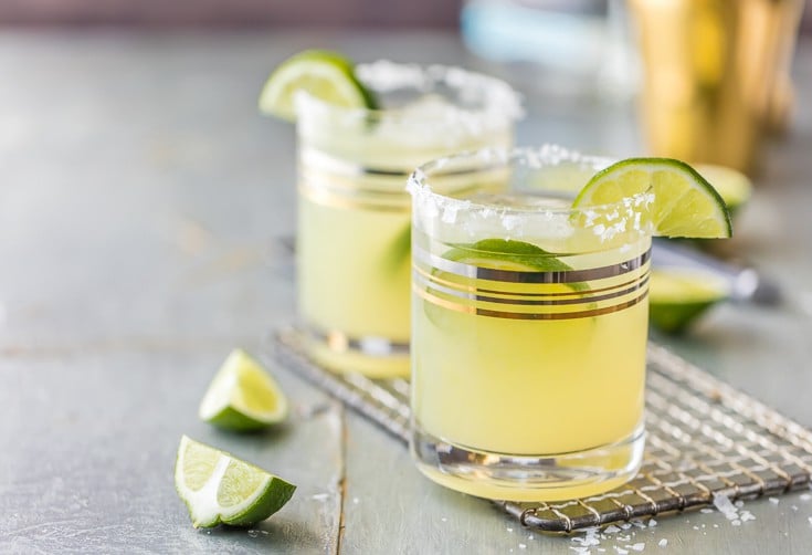 This Skinny Margarita Recipe is my go-to simple margarita recipe! With only 5 ingredients (good tequila, fruit juices, agave nectar, and soda) and lots of flavor, this classic margarita is a guilt free cocktail.Â This Skinny Margarita is just perfect for Cinco de Mayo!